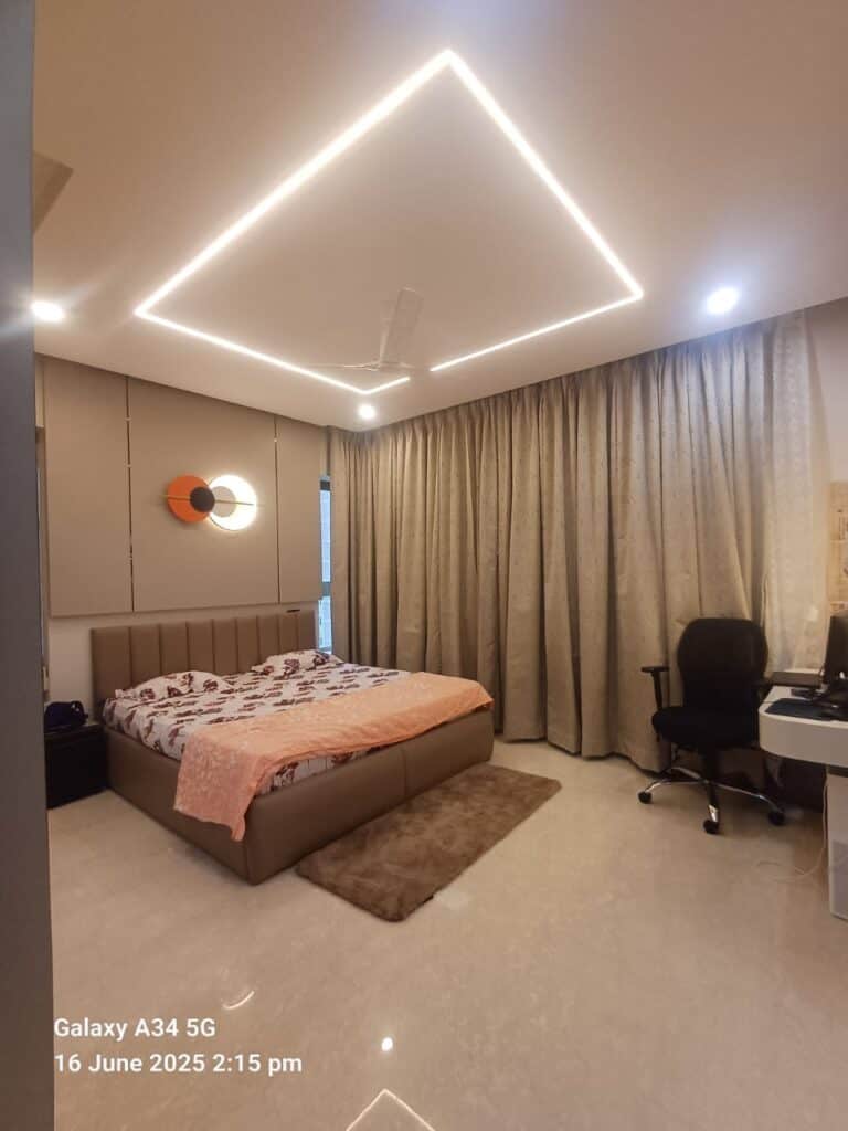 Stylish master bedroom with cozy textures and built-in wardrobe