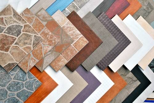 Floor tile leveling and adhesive work in progress – Interior Design Services in Mumbai