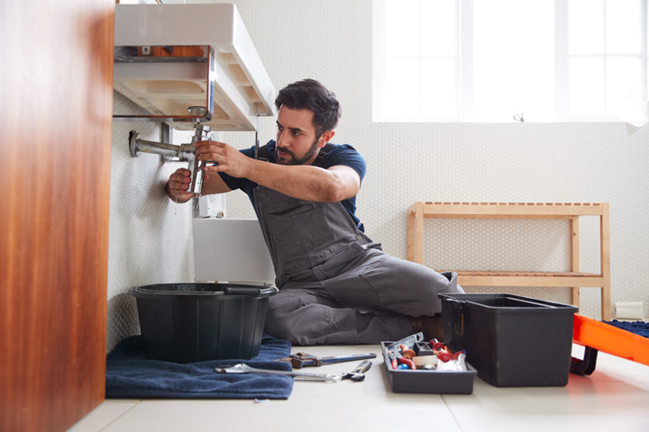 Kitchen plumbing setup with stainless steel sink and drainage system – Interior Design Services in Mumbai